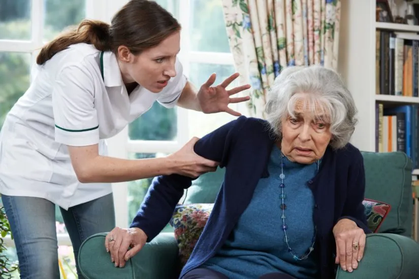 A nurse abusing an elderly woman in a nursing home-img