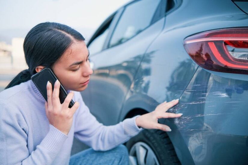 Photo of a Driver on the Phone after Accident