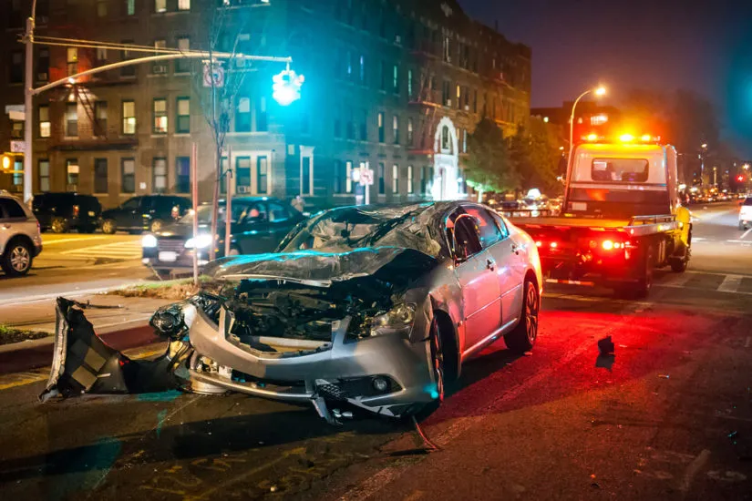 Photo of a car crash at night-img