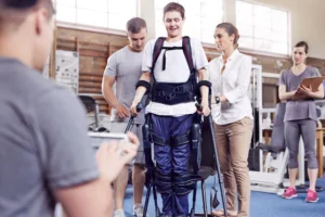 A person in physical therapy after a catastrophic accident.